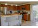 Modern kitchen featuring stainless steel appliances, quartz countertops, and a breakfast bar at , Kissimmee, FL 34744