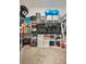 Walk-in closet with organized clothing racks, shelves, and assorted storage containers at 109 Pineywoods St, St Cloud, FL 34772