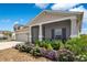 Attractive one-story home features a screened-in porch, well-kept landscaping, and an attached two-car garage at 109 Pineywoods St, St Cloud, FL 34772