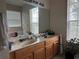 Bathroom featuring a double sink vanity with ample counter space and storage at 2991 Saint Clair St, Kissimmee, FL 34746