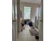 Well-lit bathroom featuring a shower, bathtub, and plenty of floor space at 2991 Saint Clair St, Kissimmee, FL 34746