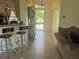 Inviting entryway offering a picturesque view of the lake from the doorway at 2991 Saint Clair St, Kissimmee, FL 34746