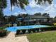Community splash pad with colorful water features and manicured landscaping at 2991 Saint Clair St, Kissimmee, FL 34746