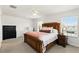 Cozy bedroom with a large bed, soft lighting, and classic decor at 3341 Rodrick Cir, Orlando, FL 32824