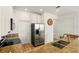 Modern kitchen with stainless steel appliances, granite countertops, and white cabinets at 3341 Rodrick Cir, Orlando, FL 32824