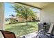 Inviting patio with grill overlooking the backyard and neighborhood at 3341 Rodrick Cir, Orlando, FL 32824