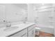 Bathroom featuring double sinks, a shower/tub, and a toilet at 1743 Carnelian St, Deland, FL 32720