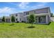 Expansive backyard view showcasing the home's outdoor space and potential for landscaping and recreation at 1745 Carnelian St, Deland, FL 32720