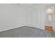 Bedroom featuring carpeted floors and a closet at 1745 Carnelian St, Deland, FL 32720