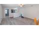 Empty carpeted bonus room with a ceiling fan, mini-trampoline, small dumbbells, and access to other rooms at 3852 Brantley Place Cir, Apopka, FL 32703