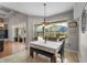 Breakfast nook featuring a table with seating, view of the pool, and lots of natural light at 3852 Brantley Place Cir, Apopka, FL 32703