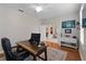 Office featuring hardwood floors, ceiling fan, desk, and decor at 3852 Brantley Place Cir, Apopka, FL 32703