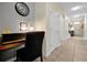Hallway featuring tile floors and an arched doorway at 8904 Candy Palm Rd, Kissimmee, FL 34747