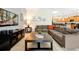 Spacious living room with tile flooring and open access to the kitchen at 8904 Candy Palm Rd, Kissimmee, FL 34747
