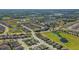 Large community aerial, showcasing numerous homes near greenbelts and ponds, promoting a serene neighborhood at 1005 Salamanca Pl, Davenport, FL 33837