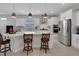 Spacious kitchen features a large island, stainless steel appliances, double oven, and recessed lighting at 1005 Salamanca Pl, Davenport, FL 33837