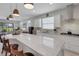 Spacious kitchen with a large island, stainless steel appliances, and open floor plan at 1005 Salamanca Pl, Davenport, FL 33837