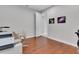 Home office featuring wood floors and ample natural light at 1005 Salamanca Pl, Davenport, FL 33837