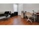 Home office space with multiple desks, chairs, and filing cabinets at 1005 Salamanca Pl, Davenport, FL 33837