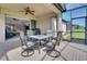 Spacious screened-in patio complete with dining set, inviting indoor-outdoor living and entertaining at 1005 Salamanca Pl, Davenport, FL 33837