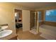 Well-appointed bathroom featuring double vanities, a soaking tub, and a separate shower at 1039 Tourmaline Dr, Kissimmee, FL 34746