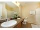 Bathroom with shower and tub combination and a spacious vanity at 1039 Tourmaline Dr, Kissimmee, FL 34746