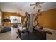 Well-equipped home gym with treadmills and weight machines, perfect for staying active at 1039 Tourmaline Dr, Kissimmee, FL 34746