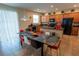Eat in kitchen features stainless steel appliances, abundant counter space, and a breakfast bar at 1039 Tourmaline Dr, Kissimmee, FL 34746