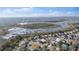 Beautiful aerial view of the community with stunning lake and neighborhood at 1067 Ronlin St, Haines City, FL 33844
