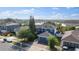 Beautiful blue two-story home with an attached two-car garage and backyard lake view at 1067 Ronlin St, Haines City, FL 33844