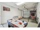 Spacious garage featuring air hockey table and basketball game for Gathering fun at 1119 Mariner Cay Dr, Haines City, FL 33844