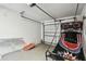 Organized garage with games, storage, and door to backyard access at 1119 Mariner Cay Dr, Haines City, FL 33844