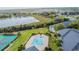 Community pool with lush surroundings, offering a serene and luxurious lifestyle at 1119 Mariner Cay Dr, Haines City, FL 33844