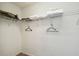 Walk-in closet with wire shelving providing ample storage space for clothing and accessories at 1119 Mariner Cay Dr, Haines City, FL 33844