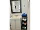 Cozy bathroom with a vanity, mirror, and shelving for towels at 1122 Spaceport Ct, Kissimmee, FL 34741