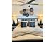 Inviting bedroom featuring a comfortable bed, bedside tables, and stylish wall decor at 1122 Spaceport Ct, Kissimmee, FL 34741