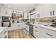 Well-lit kitchen featuring stainless steel appliances, ample counter space, and stylish decor at 11242 Stone Gate Ct, Orlando, FL 32837