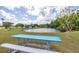 Scenic pond view from the community picnic area, a peaceful and relaxing outdoor amenity at 11242 Stone Gate Ct, Orlando, FL 32837
