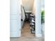 Walk-in closet with ample shelving, clothing racks, and tile flooring at 11456 Rhyme Ave, Orlando, FL 32832