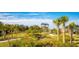 Enjoy the outdoors at this community park featuring walking paths, a bridge, and a lookout tower at 11456 Rhyme Ave, Orlando, FL 32832