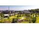 A tranquil community park featuring winding pathways, lush landscaping, and inviting recreational spaces at 11456 Rhyme Ave, Orlando, FL 32832