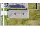 Aerial shot showcasing a home's roof, lawn and surrounding neighborhood at 1507 Bitteroot St, Kissimmee, FL 34744
