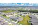 Aerial view of a residential community with manicured lawns and consistent home designs at 1507 Bitteroot St, Kissimmee, FL 34744
