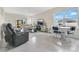 Spacious living area with tile floors, large windows, and comfortable furnishings at 1507 Bitteroot St, Kissimmee, FL 34744