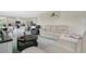 Open-concept living room features tile floors, neutral paint, and comfortable seating at 1507 Bitteroot St, Kissimmee, FL 34744