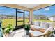 Cozy sunroom with ample natural light, comfortable seating, and views of the green outdoors at 1507 Bitteroot St, Kissimmee, FL 34744