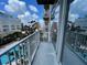 Balcony view overlooking a swimming pool and city buildings at 155 S Court Ave # 1308, Orlando, FL 32801