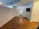 Comfortable bedroom with hardwood floors and a spacious closet at 155 S Court Ave # 1308, Orlando, FL 32801