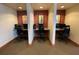 Well-equipped business center features individual workstations with computers and comfortable chairs for focused productivity at 155 S Court Ave # 1308, Orlando, FL 32801