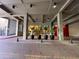 Driveway entrance with potted plants and exposed ceiling beams at 155 S Court Ave # 1308, Orlando, FL 32801